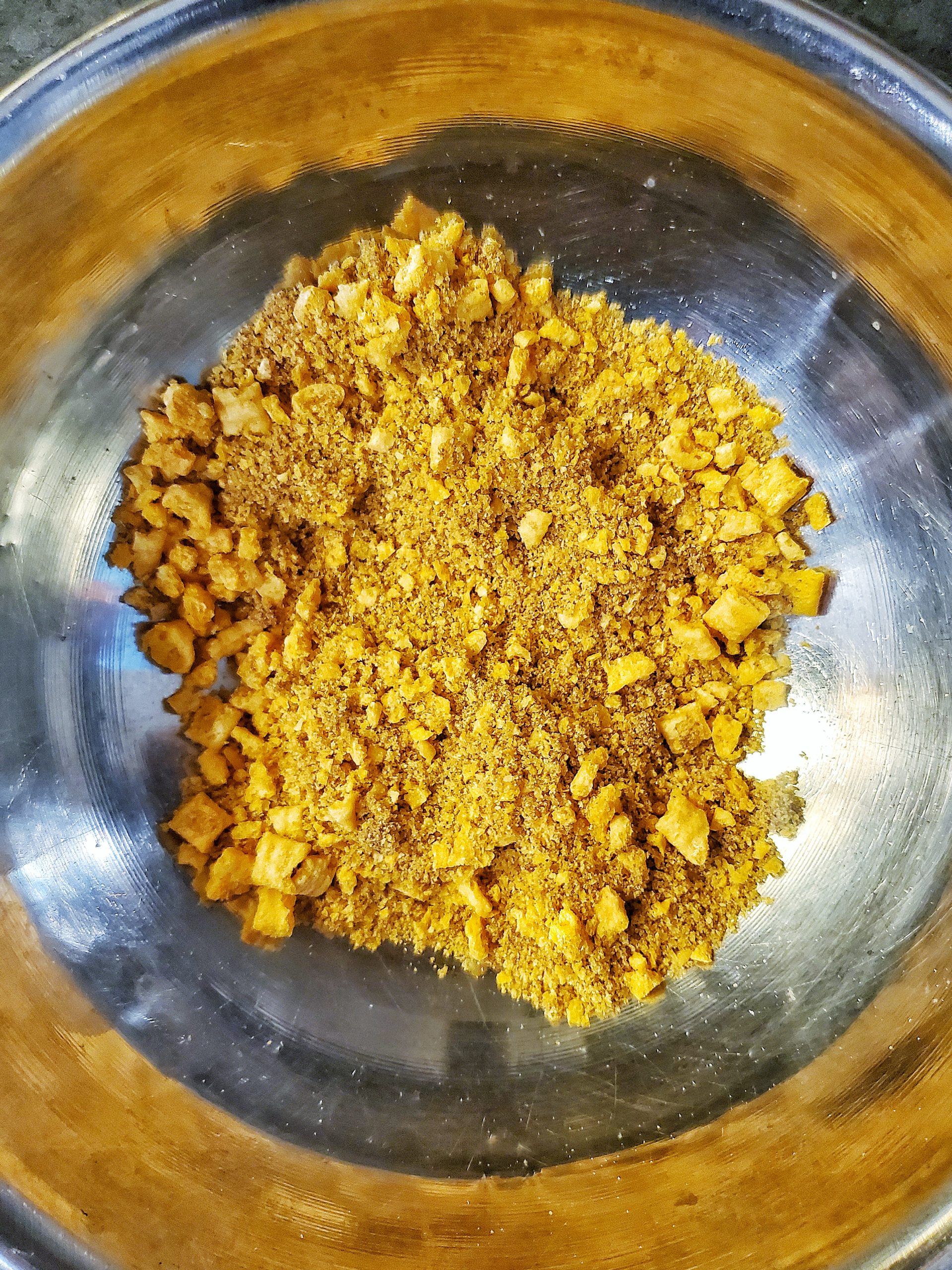 Crushed cereal with brown sugar in a bowl for cereal milk
