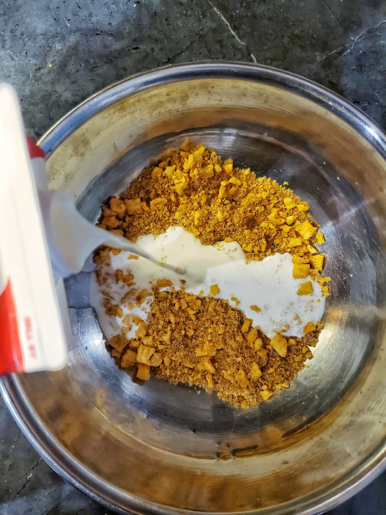 Cereal with brown sugar in a bowl with cream for cereal milk
