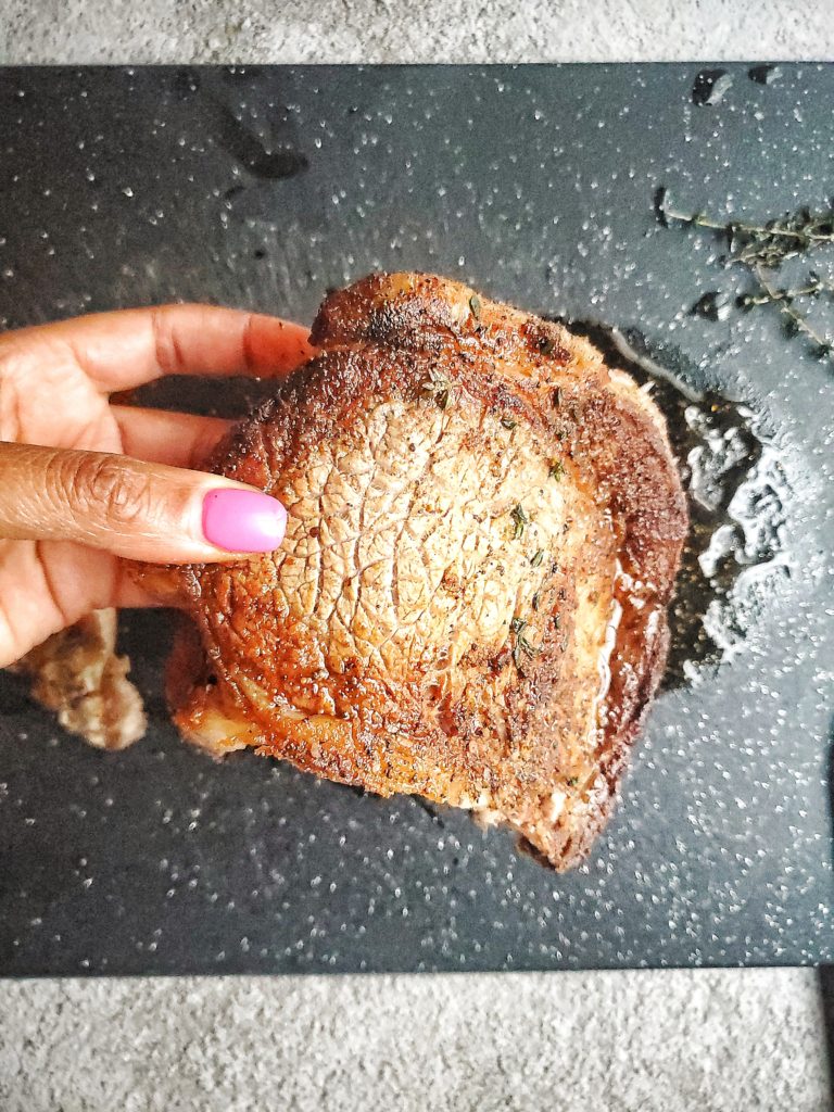 Close up of a cooked ribeye steak
