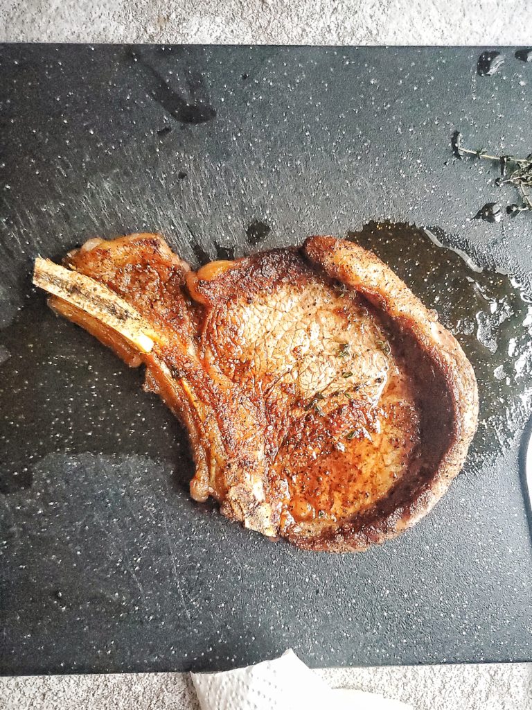 Ribeye steak on a cutting board