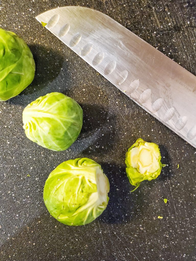 Cutting off Brussels sprout roots